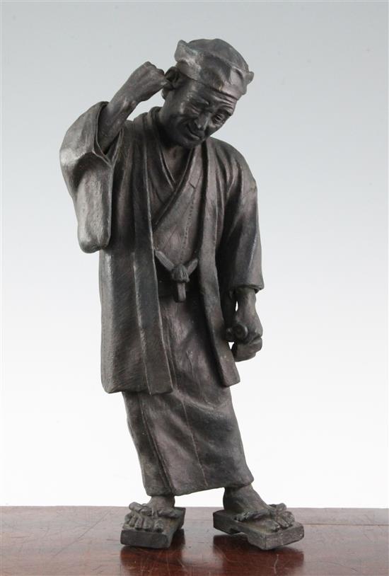 A Japanese bronze figure of an old man, 19th century, 39cm